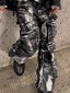 This dark streetwear collection features distressed details and roomy oversized apparel for a bold urban look.
