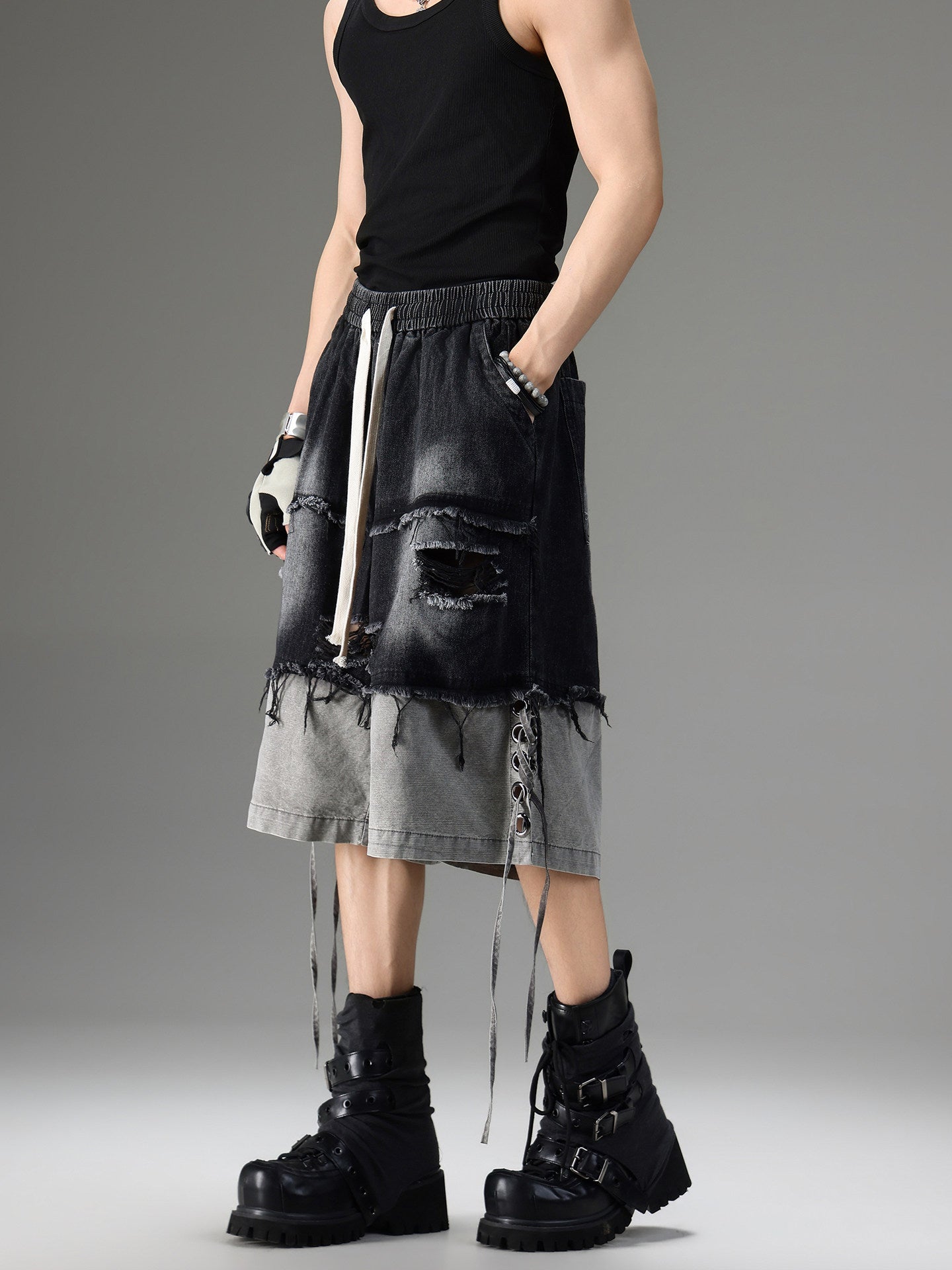 DISTRESSED RAW-EDGE PATCHWORK DENIM SHORTS