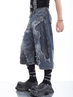 LOOSE-FIT DISTRESSED PATCHWORK CROPPED JEANS