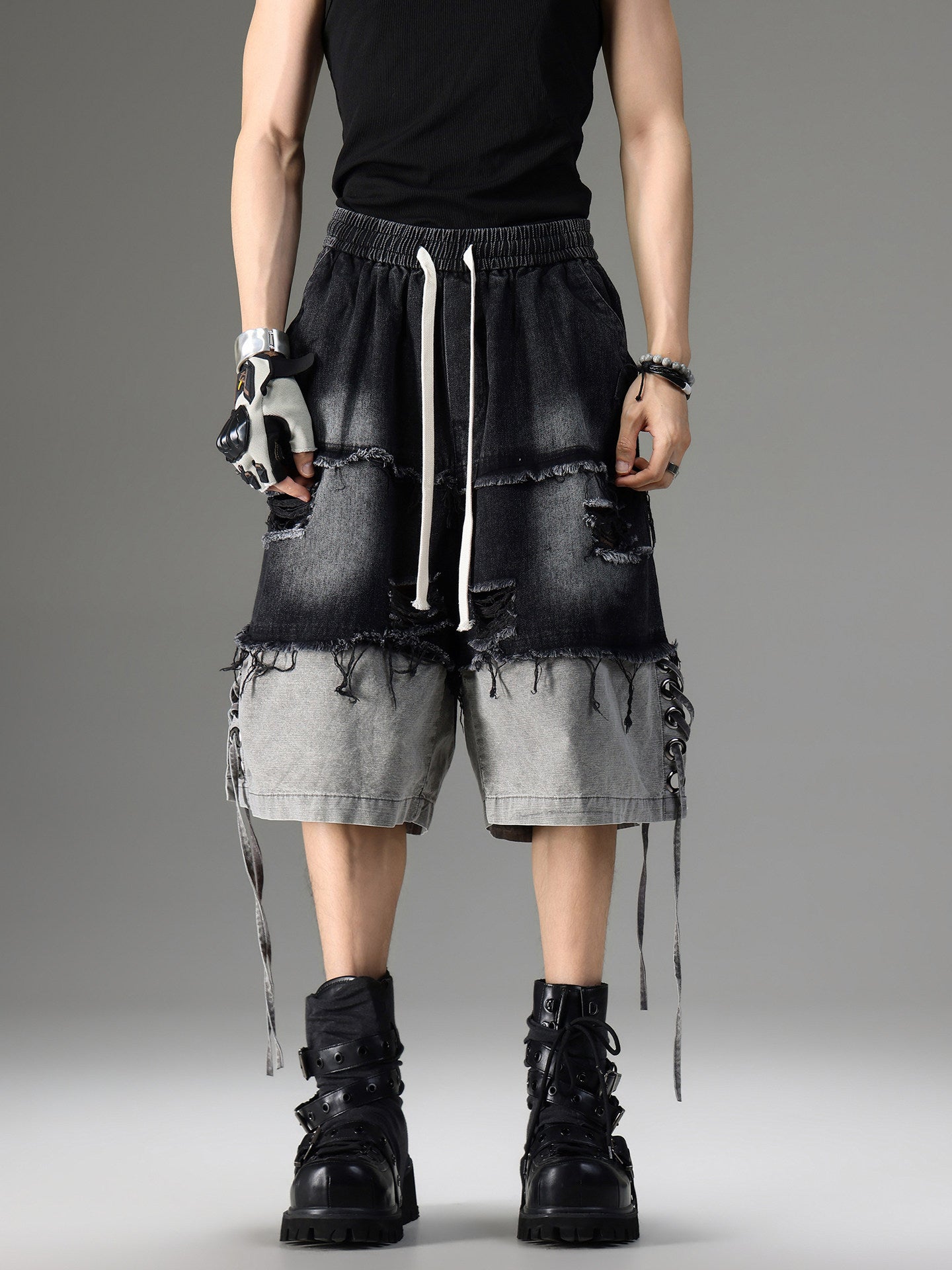 DISTRESSED RAW-EDGE PATCHWORK DENIM SHORTS