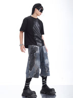 LOOSE-FIT DISTRESSED PATCHWORK CROPPED JEANS