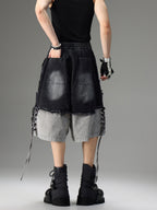 DISTRESSED RAW-EDGE PATCHWORK DENIM SHORTS