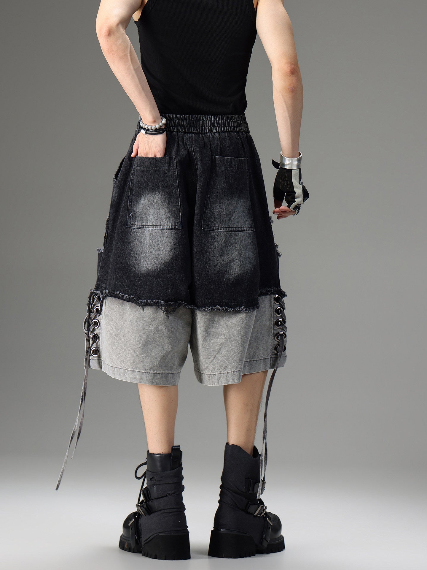 DISTRESSED RAW-EDGE PATCHWORK DENIM SHORTS