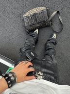 IRREGULAR STRUCTURE WAXED FLARED PANTS