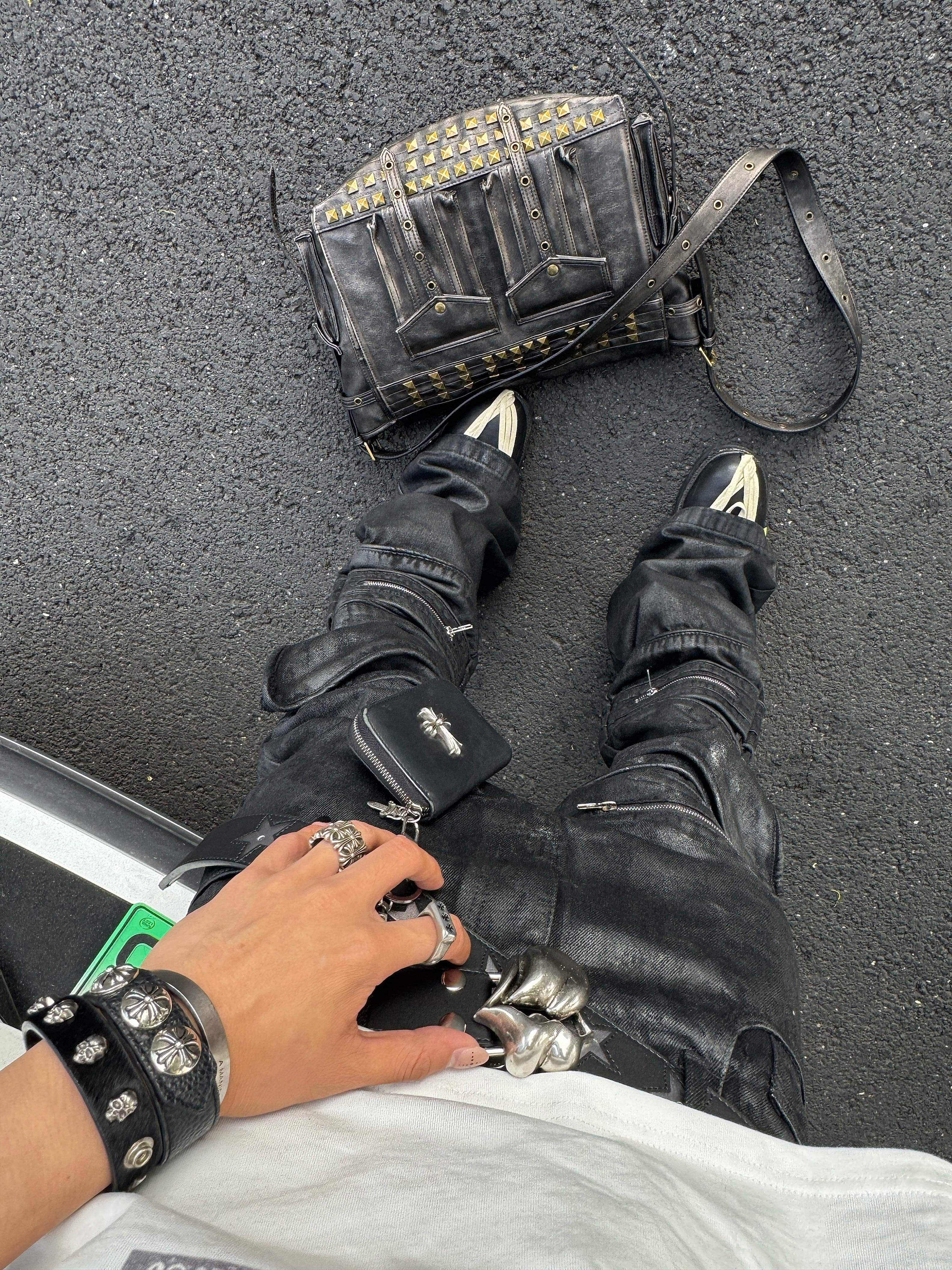 IRREGULAR STRUCTURE WAXED FLARED PANTS