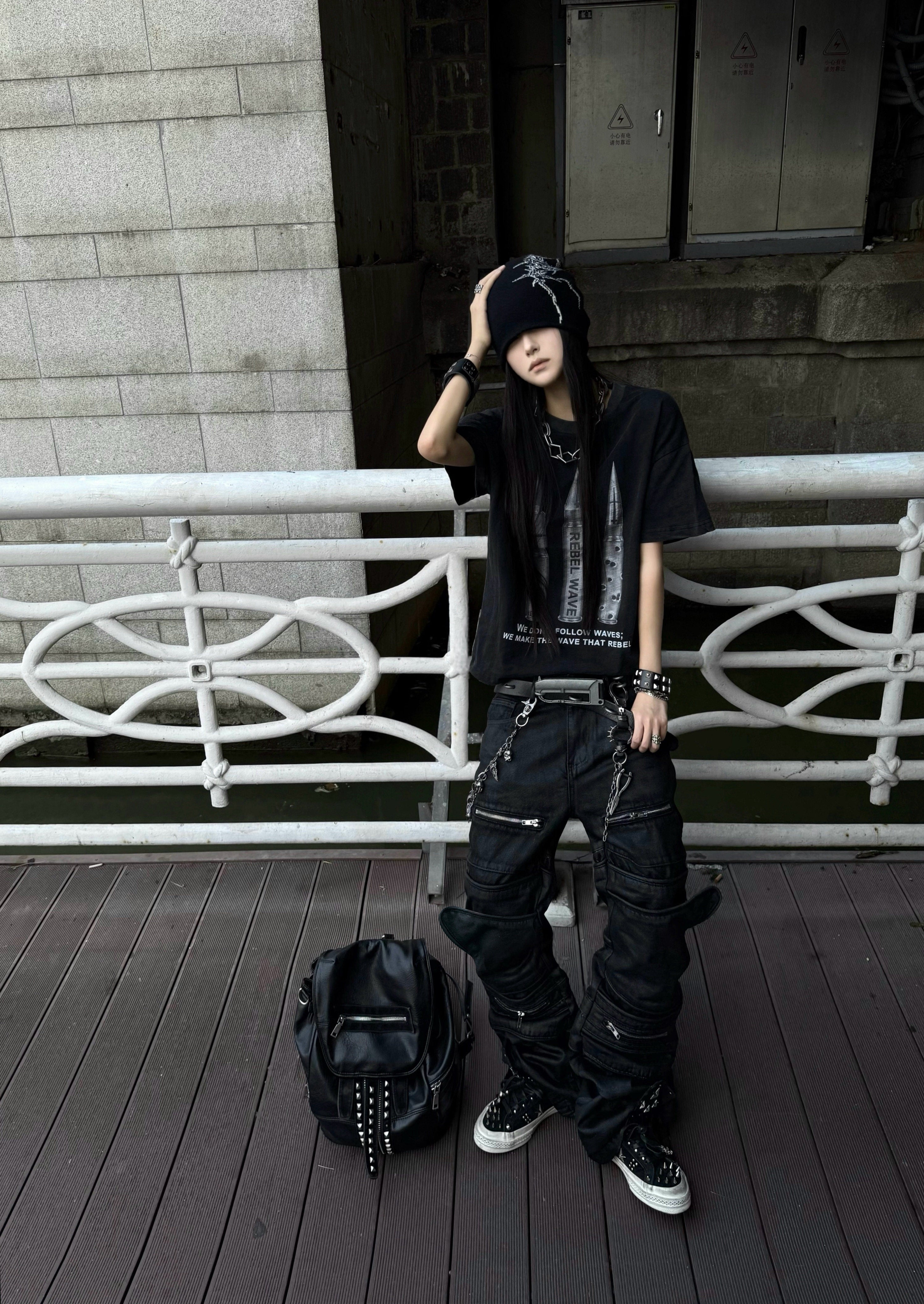 IRREGULAR STRUCTURE WAXED FLARED PANTS