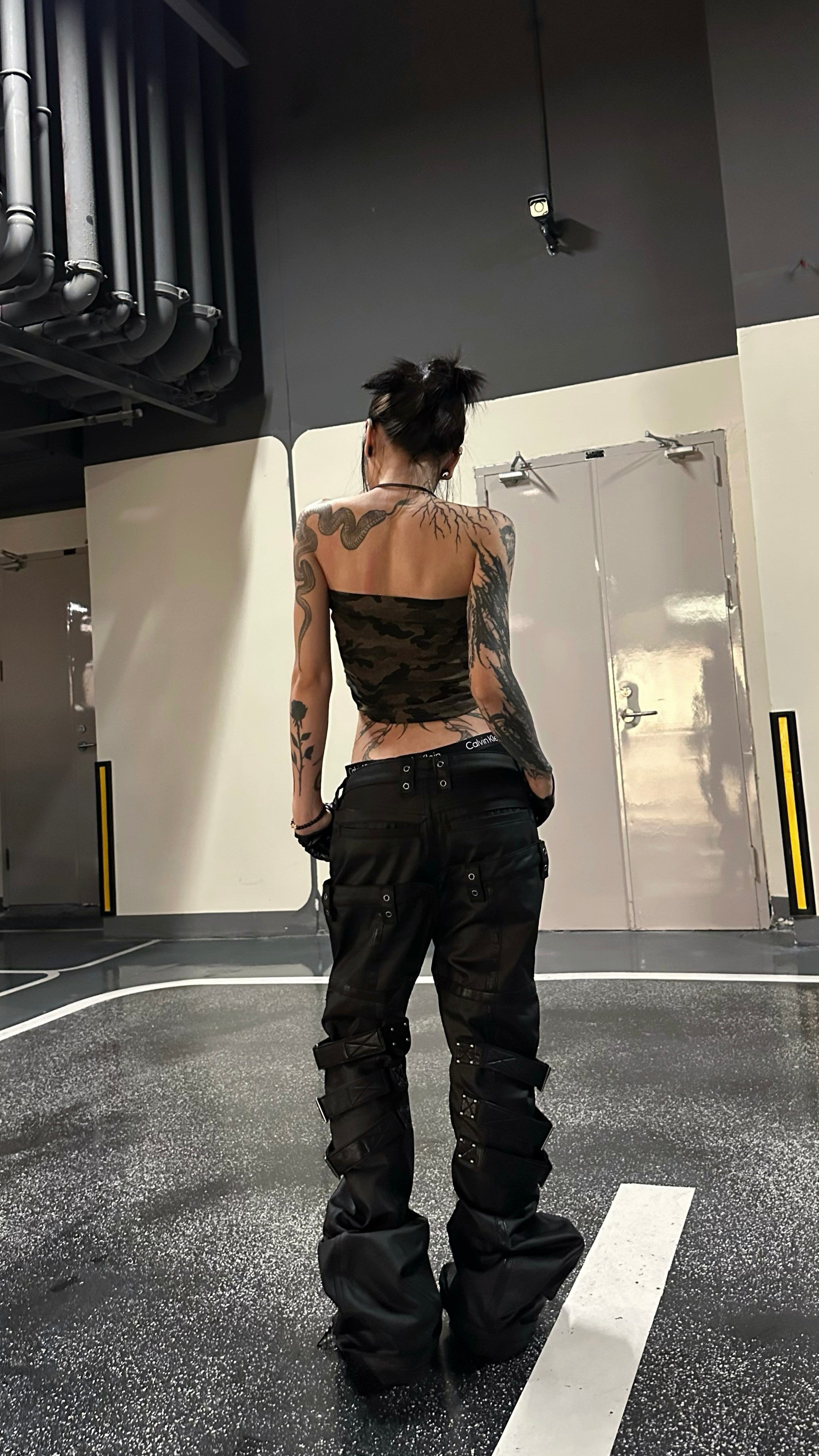 WAXED PATCHWORK STACKED STRAP DOUBLE‑WAIST CURVED SKINNY PANTS