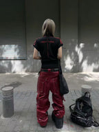 DARKPTPTS RED COATED SILHOUETTE RIVET PANTS