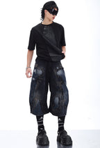 LOOSE-FIT DISTRESSED PATCHWORK CROPPED JEANS