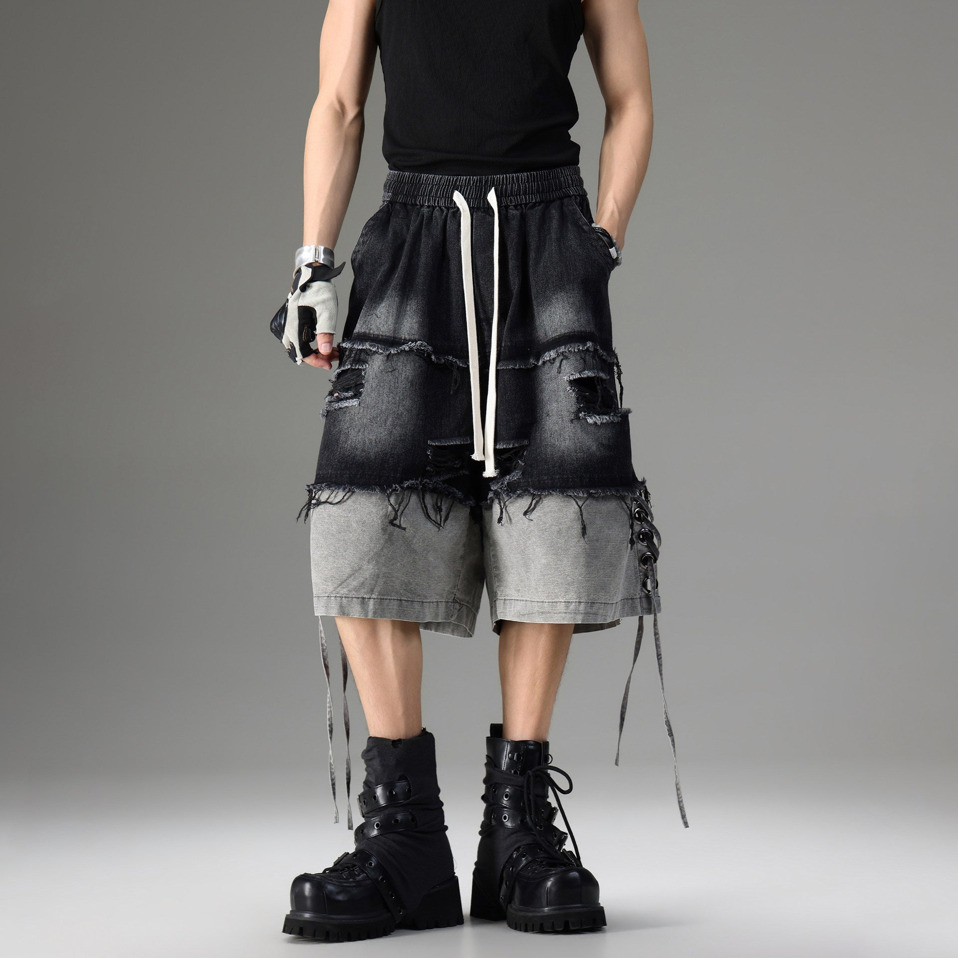 DISTRESSED RAW-EDGE PATCHWORK DENIM SHORTS