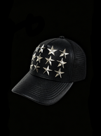 STAR RIVET LITCHI LEATHER CURVED BRIM TRUCKER HAT