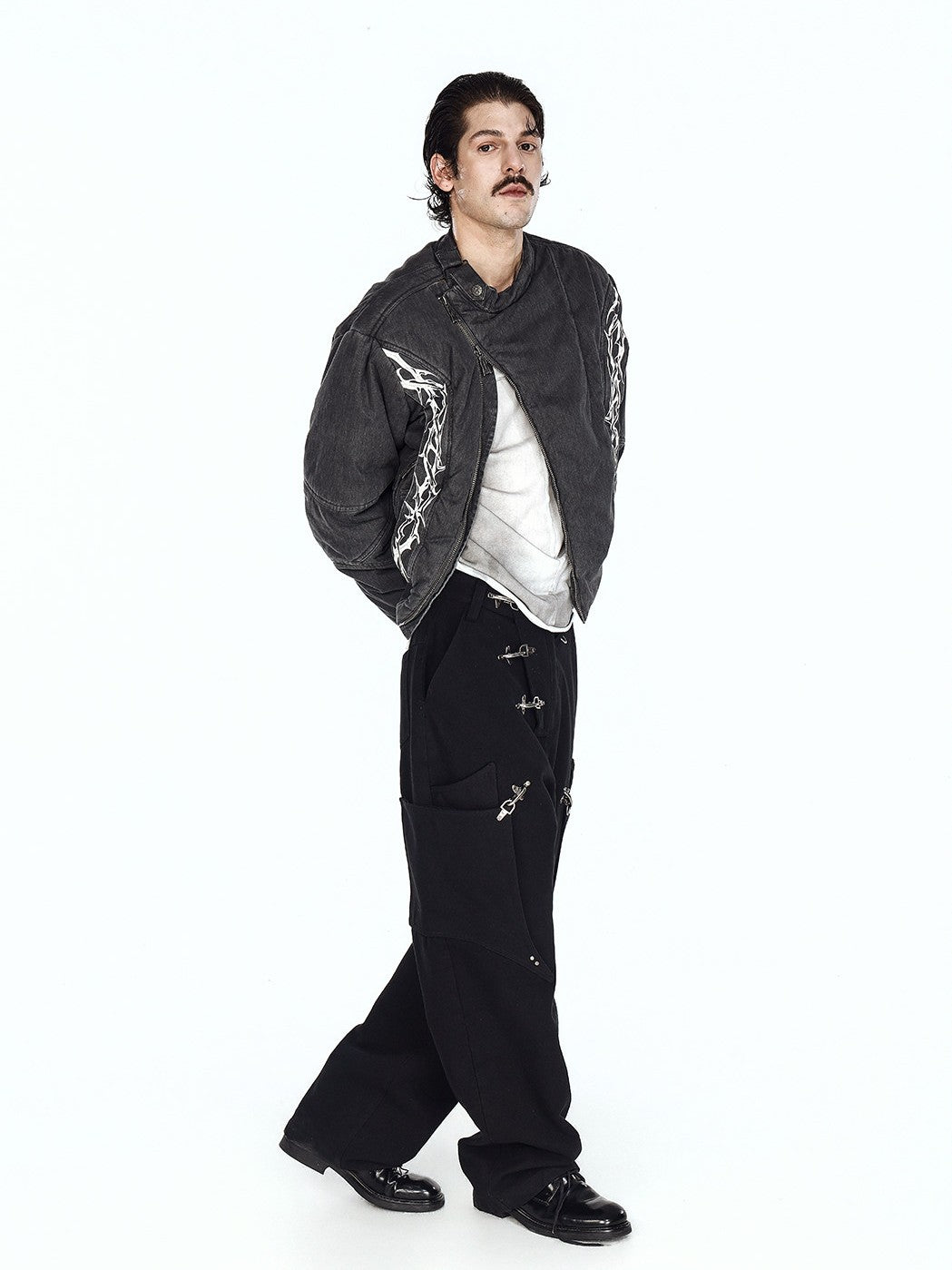 Acid wash oversized graphic hoodie boasts iconic acid wash fading and bold graphic print for striking retro streetwear aesthetics.