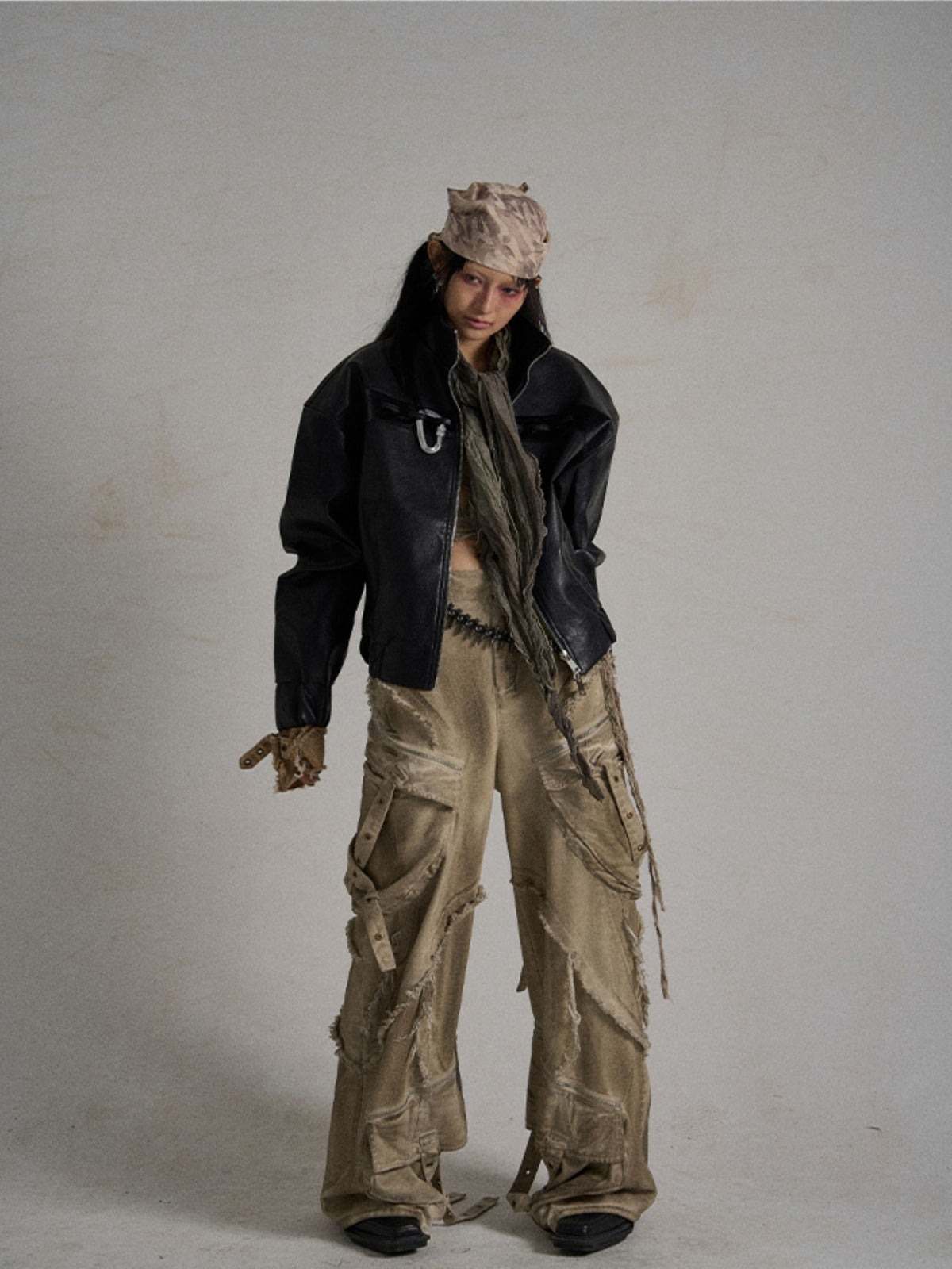 Asymmetrical-cut edgy street outerwear features irregular asymmetrical cutting and sharp structural lines, delivering avant-garde and rebellious street fashion vibes.