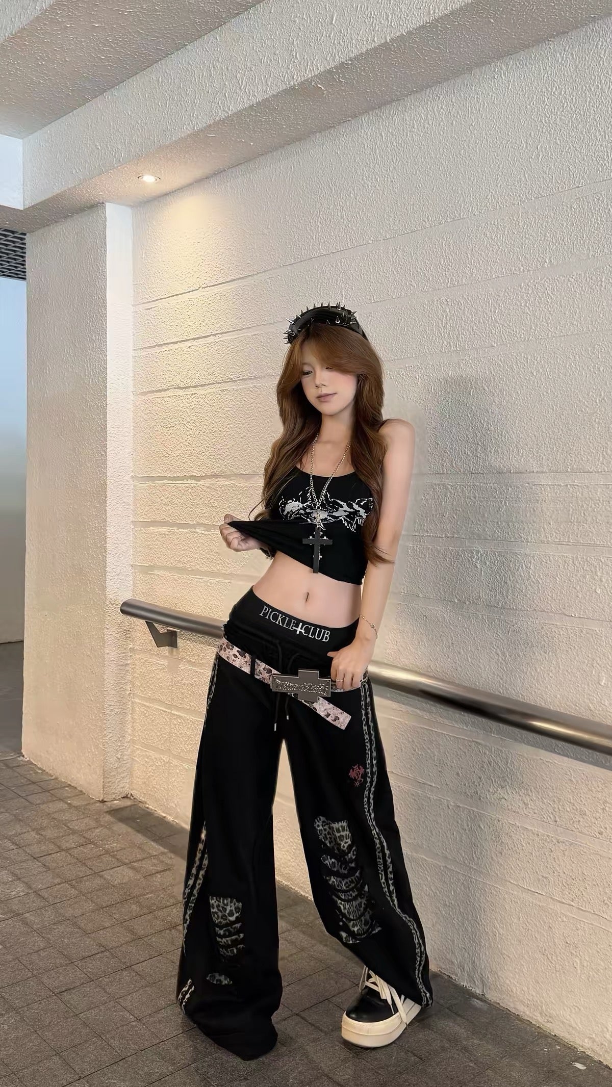 daring asymmetrical cutout contours define this alternative street top, featuring irregular hollow detailing to craft avant-garde bold silhouettes for edgy underground daily outfits