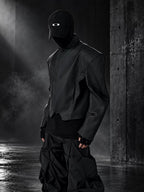 This avant-dark mismatched seam parka features deconstructed stitching and moody dark tones for boundary-pushing streetwear.