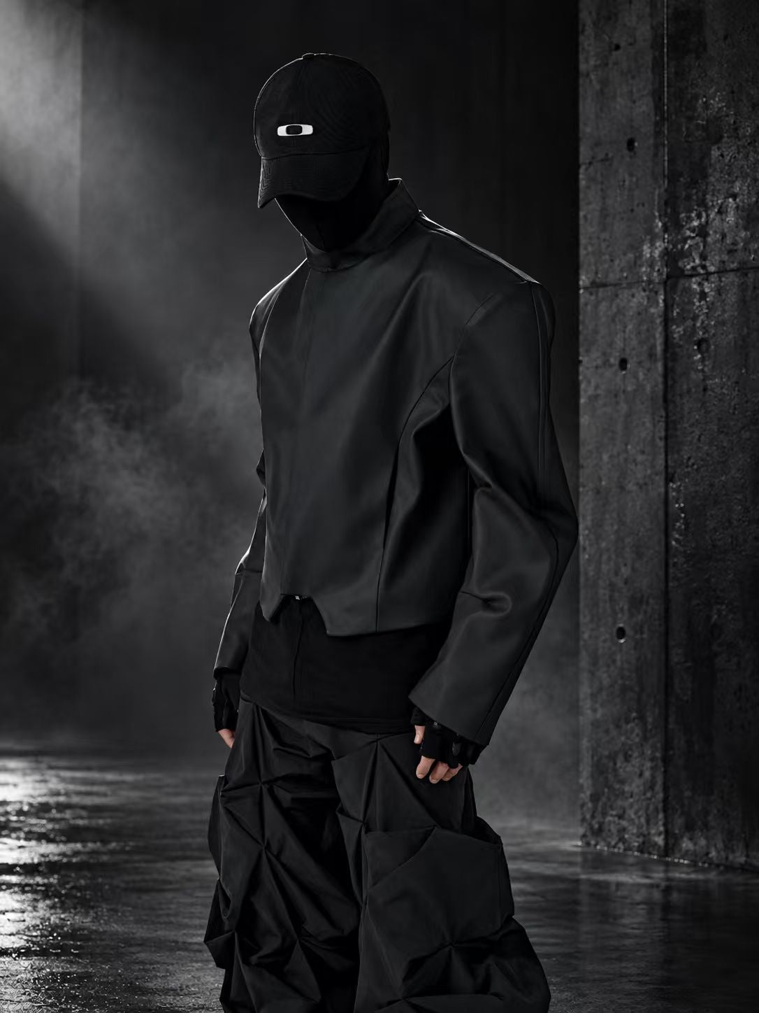 This avant-dark mismatched seam parka features deconstructed stitching and moody dark tones for boundary-pushing streetwear.