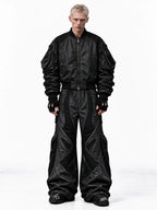 Baggy cargo pant with chain accessory delivers a slouchy wide-leg utility silhouette paired with detachable metal chain hardware, amplifying punk-inspired street edge and functional multi-pocket styling.