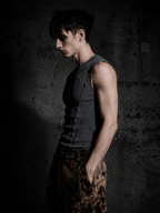 Dark monochrome edgy fashion wear, unified dark tone exudes cool mysterious vibe.