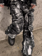 This dark streetwear collection features distressed details and roomy oversized apparel for a bold urban look.