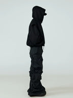 This dystopian oversized dark print jacket features dramatic dystopian themed graphics and a loose bulky silhouette, creating futuristic grim vibes for underground alternative outfits.