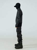This dystopian raw-cut black outerwear delivers bold deconstructed aesthetics for underground street styling.