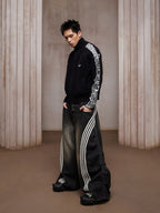 Edgy pullover with taped seam structure features exposed taped seams and a sculptural cut for bold structural street styling.