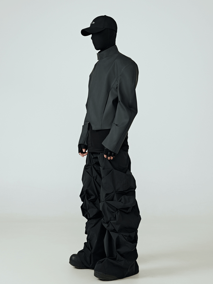 This eerie print slouchy black jumpsuit blends haunting graphic details with a relaxed, dark silhouette for bold alternative styling.
