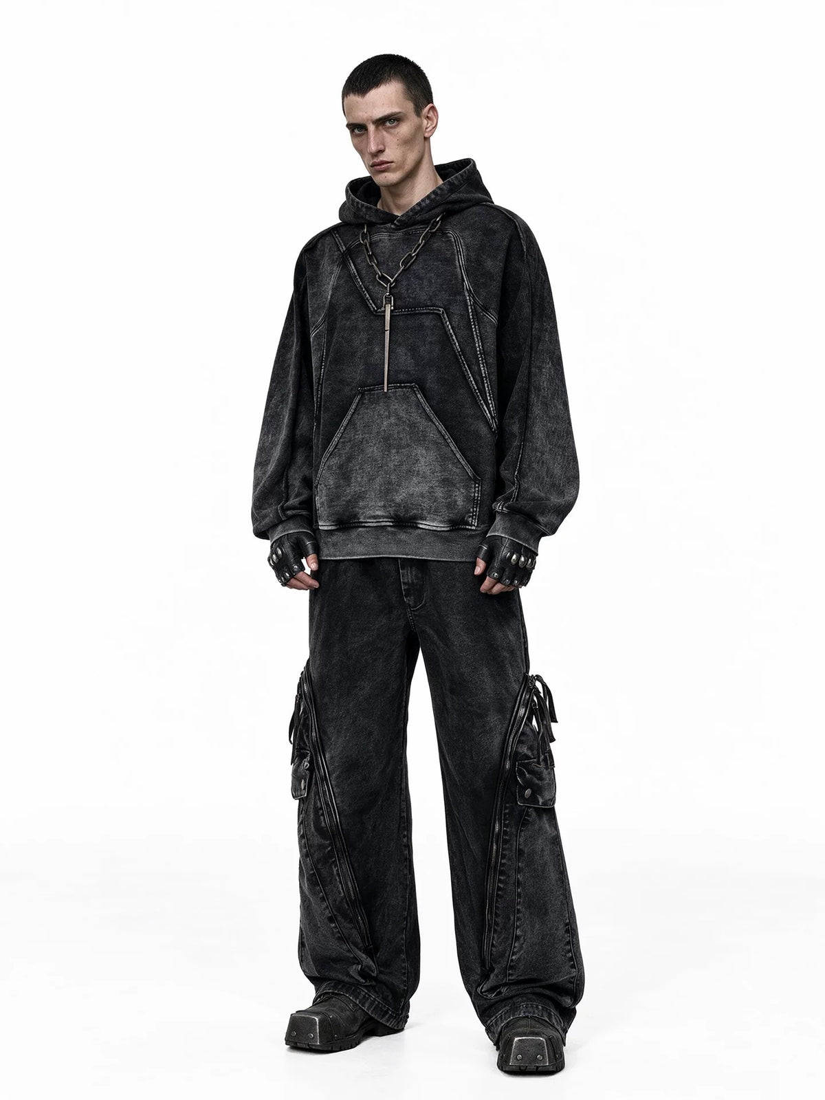 Faded wide leg pant with raw hem presents vintage faded coloring and unfinished raw frayed hems, offering casual slouchy drape and rugged deconstructed texture for utility streetwear looks.