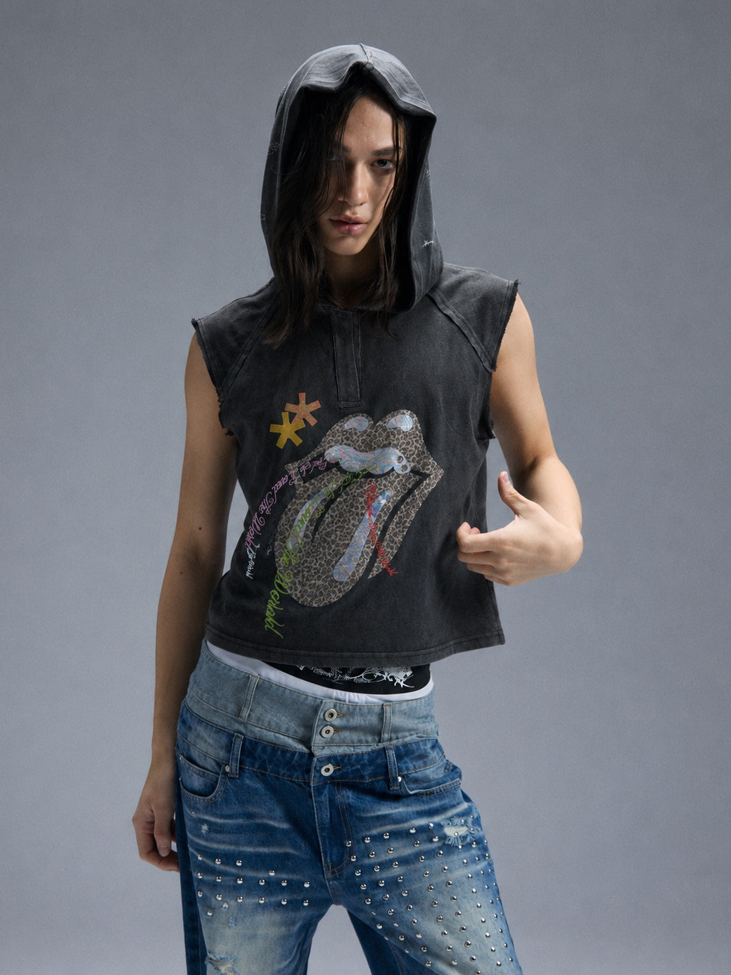 Distinct frayed hem and ripped detailing shape this grunge vintage denim, showcasing rugged retro distressed texture for edgy street fits