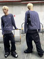 Dynamic glitch-text-print decorates this edgy urban top. Fragmented distorted letter graphics match a relaxed fit to create striking futuristic urban streetwear appeal.