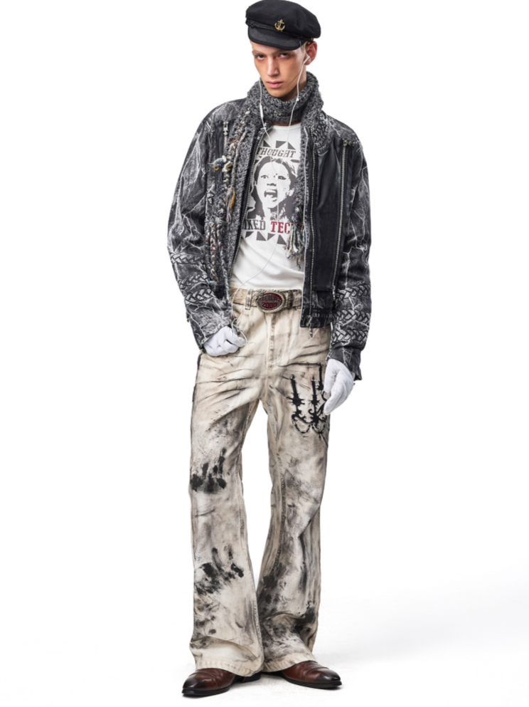 This grunge faded graphic street tee features washed-out vintage print and worn fabric texture for authentic alternative urban aesthetics.