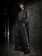 Monogram print luxury urban apparel, repeated monogram printing delivers sophisticated upscale texture.