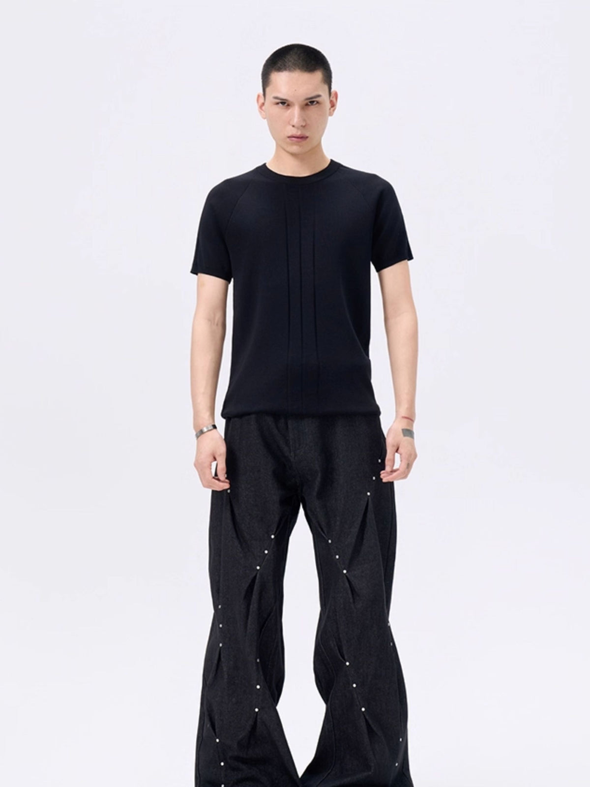Patchwork graphic boxy longtee with mixed collage-style prints and a structured square fit, blending eclectic visual layers and casual street edge for versatile layered looks.