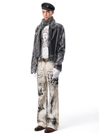 This punk ripped asymmetric black jacket has frayed tear accents and an uneven cut, delivering bold rebellious vibes for alternative street outfits.