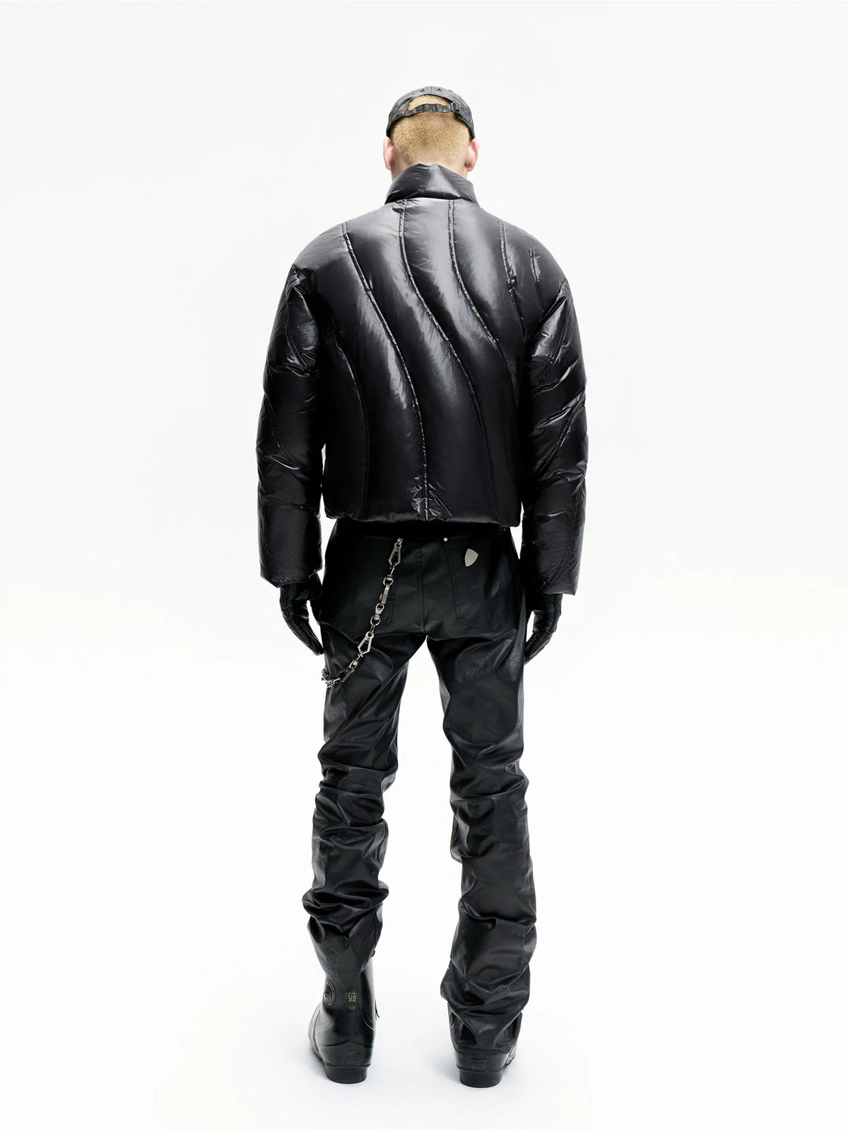 This punk ripped black streetwear jacket embodies rebellious edge with torn detailing and a bold underground style.