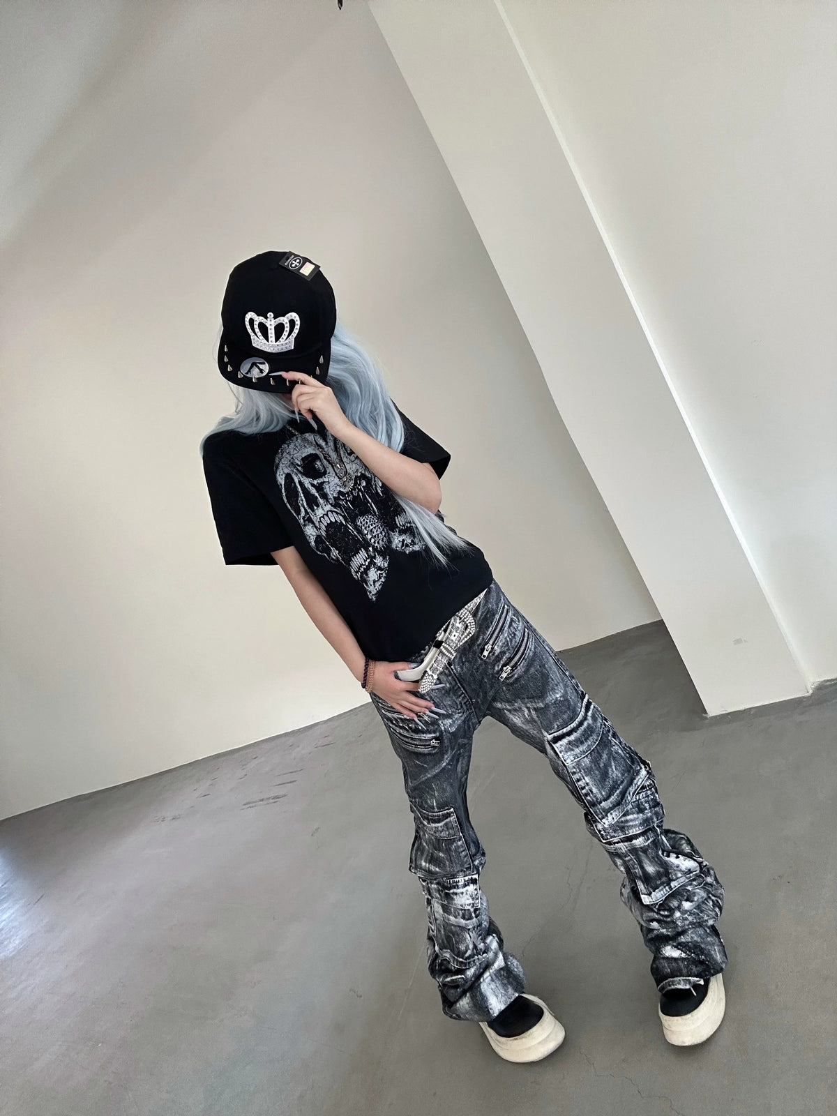 This punk urban ripped long sleeve top features torn detailing to create a raw, rebellious city street look.