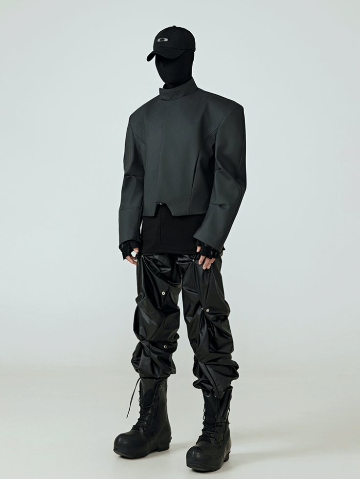 These shadow dye stitched wide trousers showcase moody faded tones and hand-finished stitching for distinct street styling.