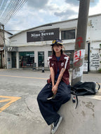 Daring single-shoulder-cut shapes this alternative street top. Sleek asymmetric neckline and relaxed fit deliver bold edgy silhouette for avant-garde underground streetwear styling.