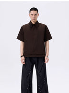 Skatecore raw edge cargo shorts with untrimmed raw hem detailing and functional multi-pocket design, cut in a casual relaxed silhouette that channels gritty, genuine skate subculture style.