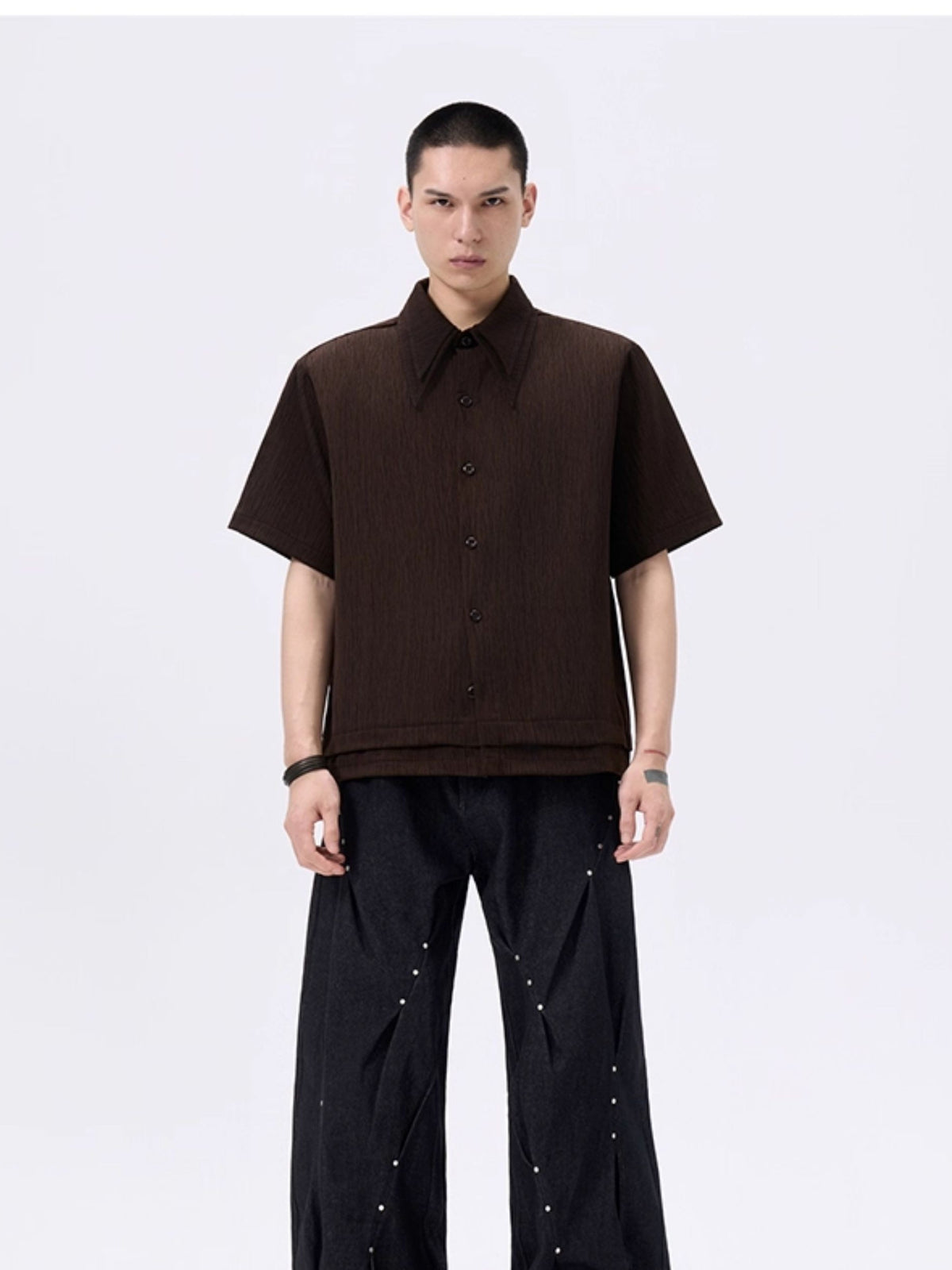 Skatecore raw edge cargo shorts with untrimmed raw hem detailing and functional multi-pocket design, cut in a casual relaxed silhouette that channels gritty, genuine skate subculture style.
