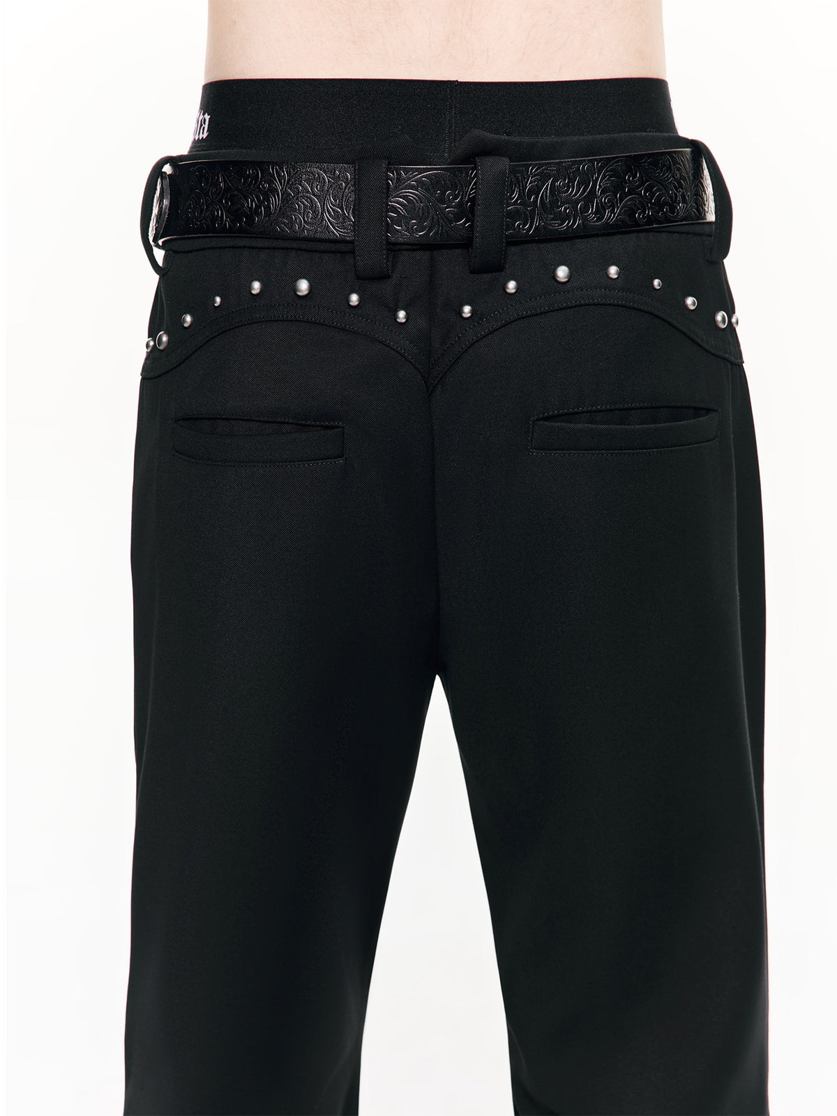 Skeletal print crinkle street pants with rumpled textured fabric and haunting skeleton graphics, delivering rugged underground edge for moody alternative street fits.