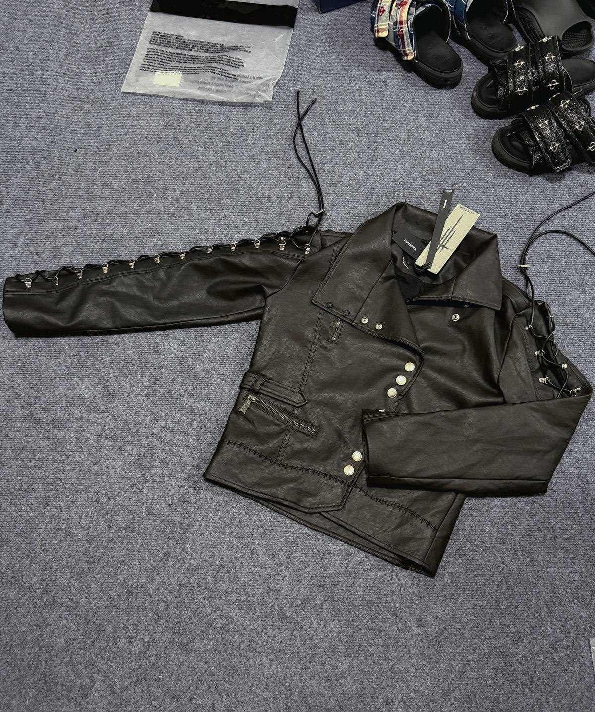 Stitched patch urban sweat jacket features hand-stitched patch accents and soft sweat fabric for authentic casual urban streetwear.