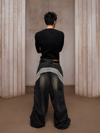 Street culture jogger pant with pigment spray carries mottled spray wash effects and a tapered relaxed fit for authentic urban street flair.
