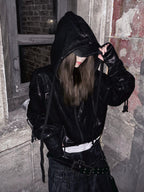 Streetwear rivet detail oversized tee is decorated with metal rivet accents and a roomy oversized cut for raw streetwear flair.