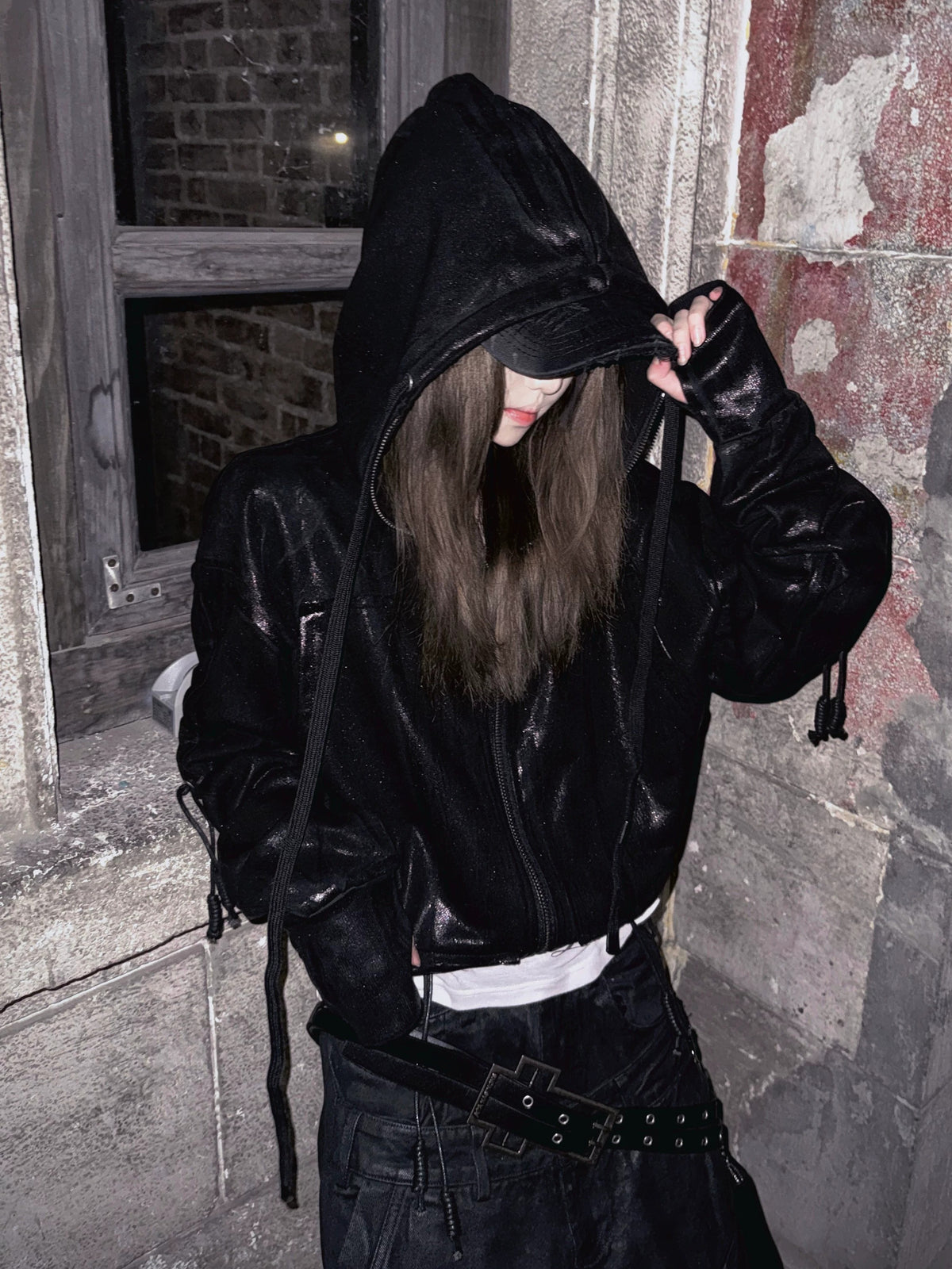 Streetwear rivet detail oversized tee is decorated with metal rivet accents and a roomy oversized cut for raw streetwear flair.