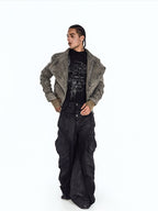 Vintage tag distressed denim pants have retro tag accents and worn distressed details, creating timeless urban street denim aesthetics.