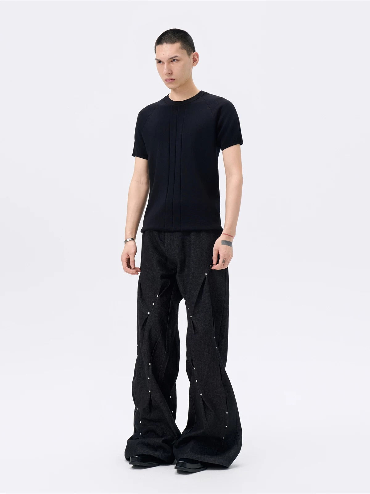 Vintage wash baggy graphic tee featuring weathered faded tones and a spacious relaxed cut, combining retro worn-in texture with standout prints for effortless underground street styling.