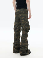 Void graphic raw seam jogger pants featuring unsettling dark prints and unfinished raw seams, blending underground edge with casual comfort for alternative street styling.